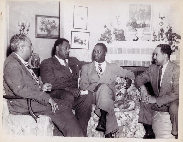 seated l to r: Arna Bontemps, Paul Robeson, Canada Lee & Langston Hughes, 1946